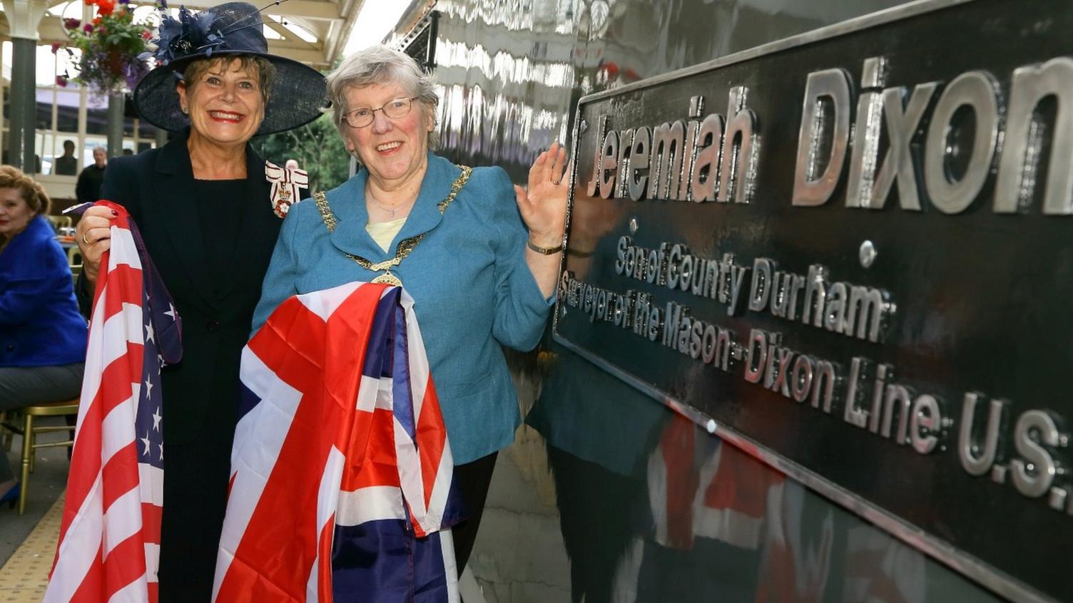 Councillor Pauline Charlton, (right) and the Lord Lieutenant of County Durham, Sue Snowdon, unveiling the Jeremiah Dixon